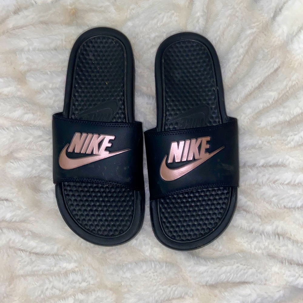 Black/rose gold Nike slides